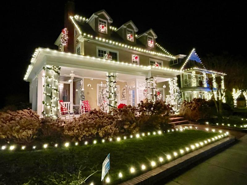 Pilotttown Road is perhaps the best-lit street in Lewes with several homes, like these neighbors, decorated to the maximum.